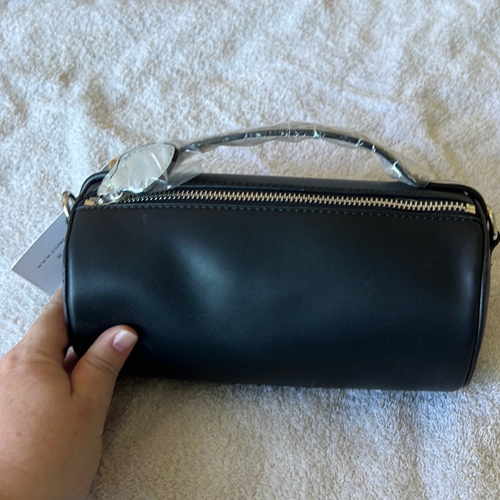 Small cylinder purse